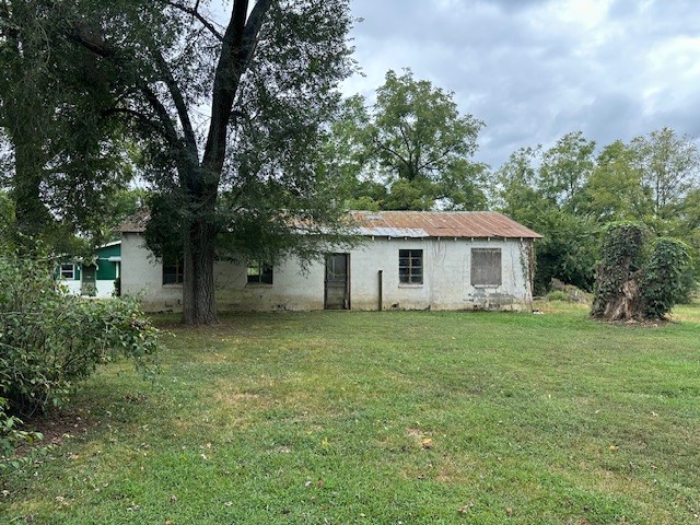 235 Old Mulberry Road Fayetteville, TN 37334 - Photo 23 of 37 a front view of a house with a garden
