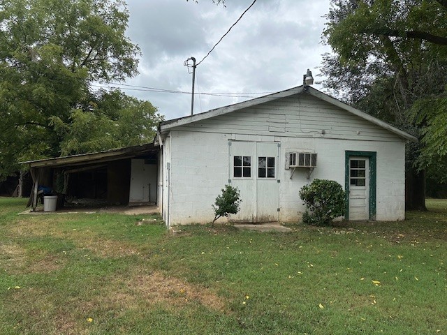 235 Old Mulberry Road Fayetteville, TN 37334 - Photo 24 of 37 a front view of house with yard and trees in the background
