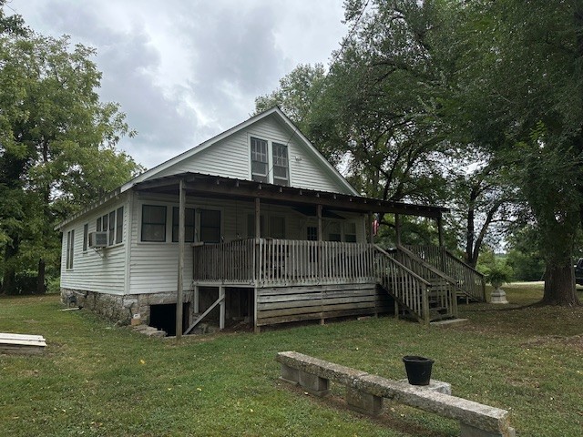 235 Old Mulberry Road Fayetteville, TN 37334 - Photo 6 of 37 a view of house with backyard