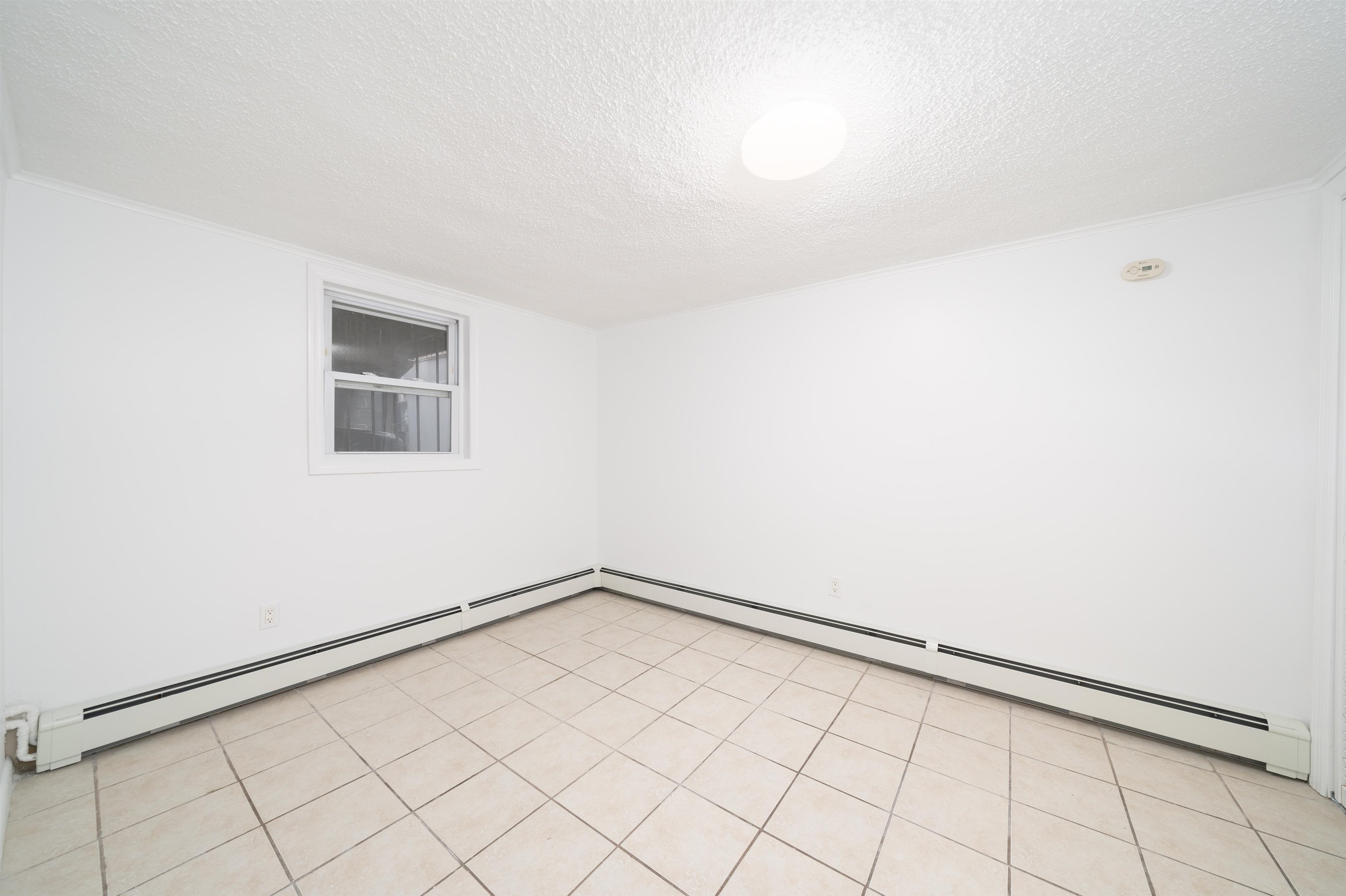 720 Liberty Avenue, Unit 1 North Bergen, NJ 07047 - Photo 7 of 9 a view of an empty room