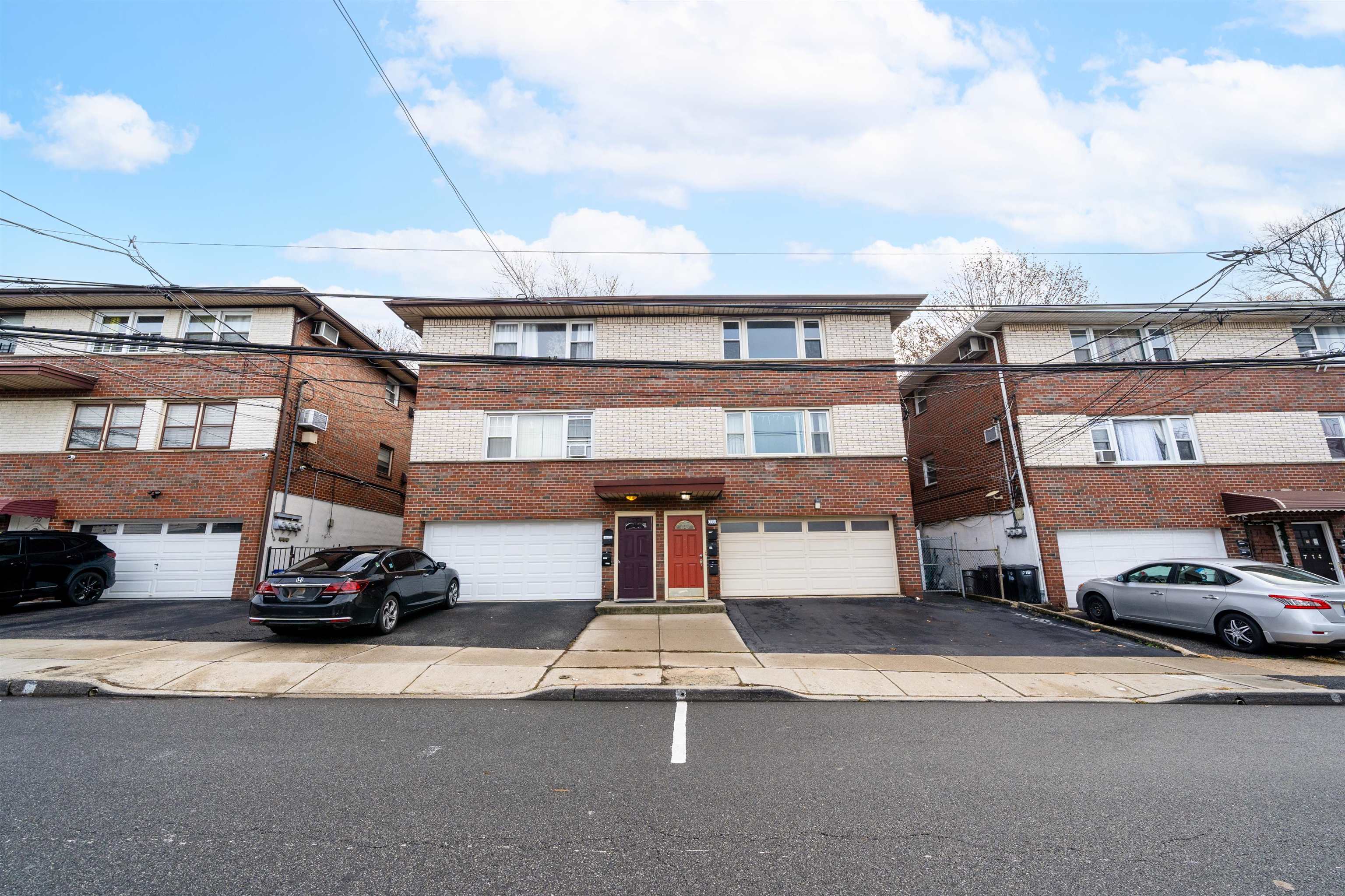 720 Liberty Avenue, Unit 1 North Bergen, NJ 07047 - Photo 8 of 9 a car parked in the parking lot of a building