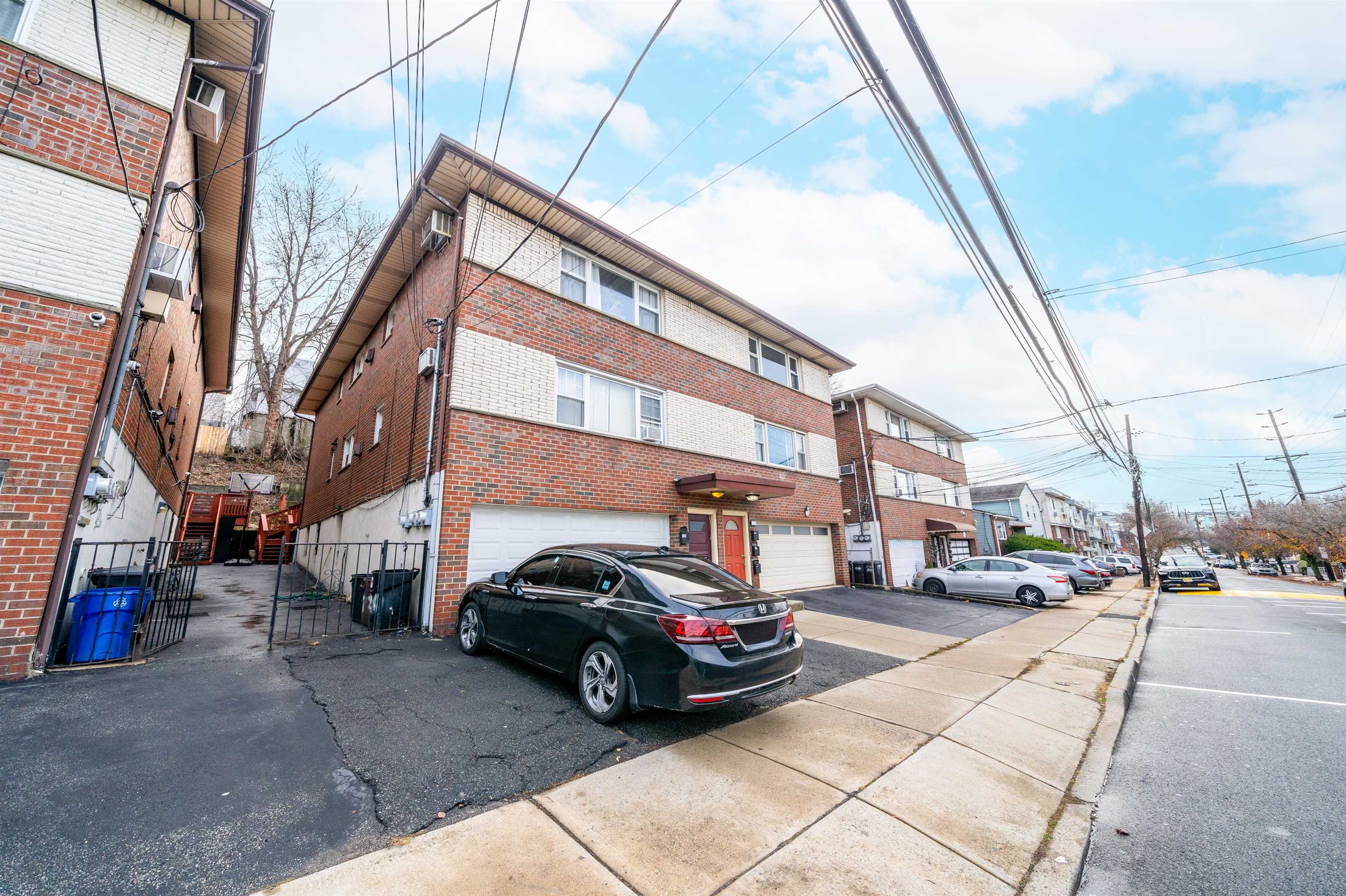 720 Liberty Avenue, Unit 1 North Bergen, NJ 07047 - Photo 9 of 9 a view of a car park in front of a building