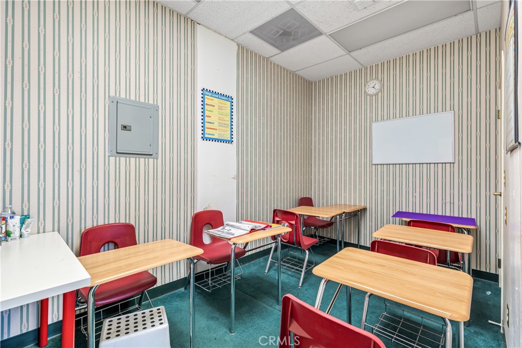 22706 Aspan Street, Unit 16 Lake Forest, CA 92630 - Photo 16 of 34 a room with furniture and a rug