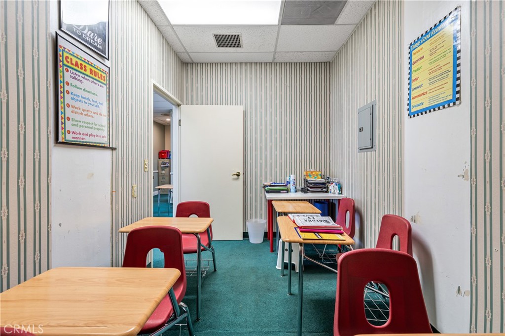 22706 Aspan Street, Unit 16 Lake Forest, CA 92630 - Photo 17 of 34 a living room with furniture and a lamp