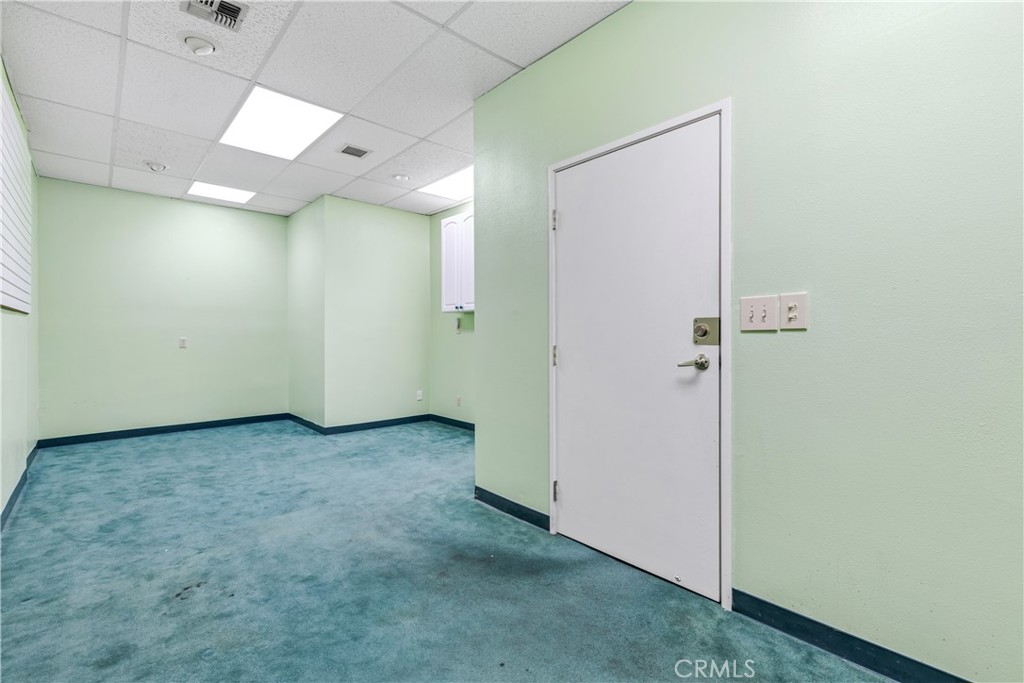 22706 Aspan Street, Unit 16 Lake Forest, CA 92630 - Photo 23 of 34 a view of a hallway with closet