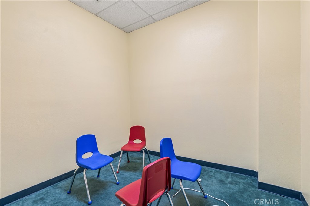 22706 Aspan Street, Unit 16 Lake Forest, CA 92630 - Photo 25 of 34 a view of a room with table and chair