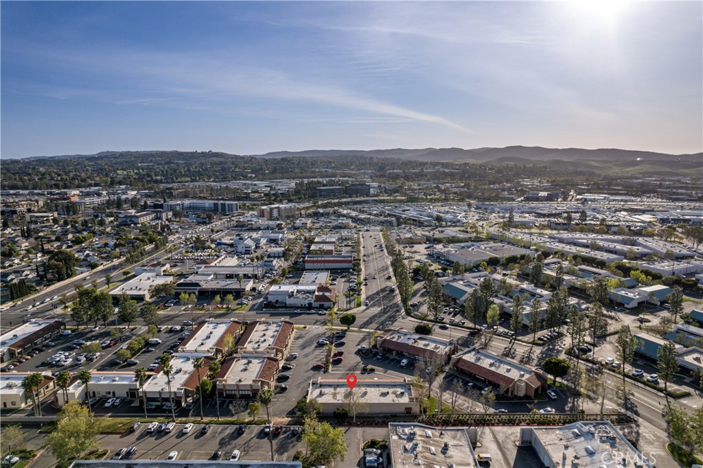 22706 Aspan Street, Unit 16 Lake Forest, CA 92630 - Photo 30 of 34 an aerial view of residential building and city view