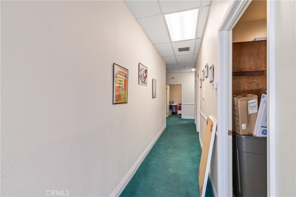 22706 Aspan Street, Unit 16 Lake Forest, CA 92630 - Photo 10 of 34 a view of a hallway with a white walls