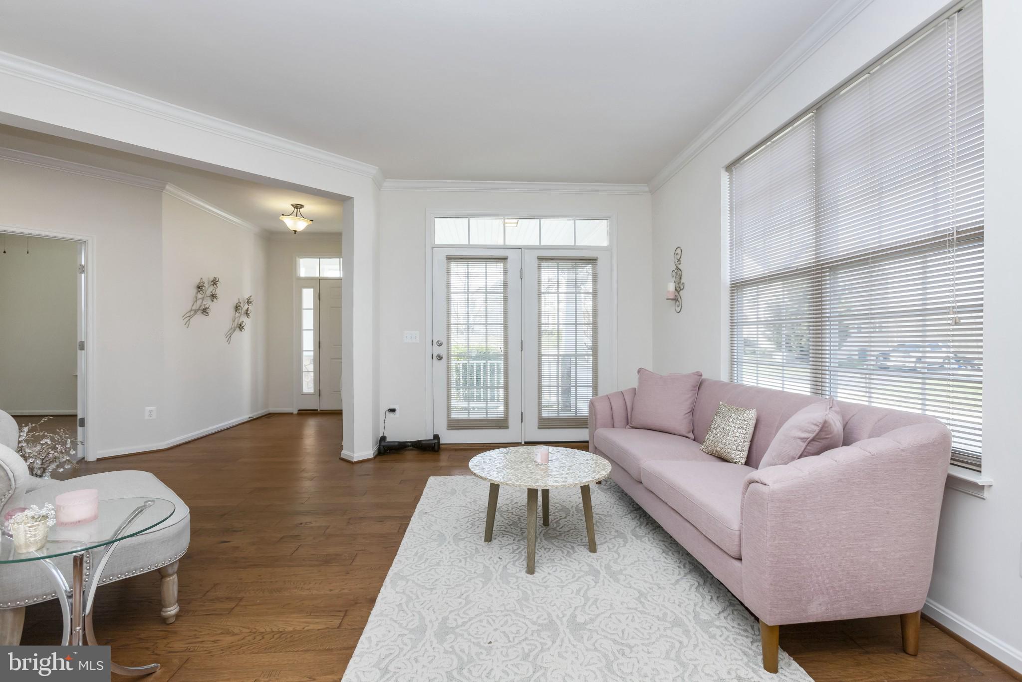 43114 Rocks Way Leesburg, VA 20176 - Photo 37 of 37 Open floorplan parlor with door to front porch!