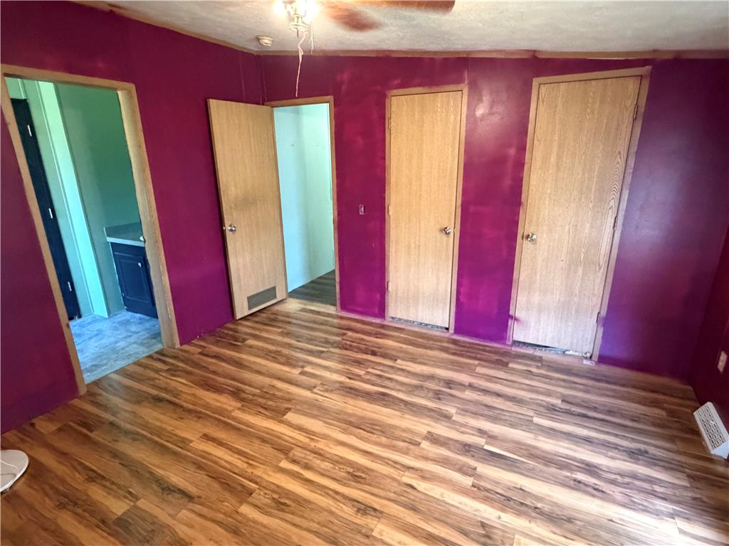 4541 Main Street Slatington, PA 18080 - Photo 18 of 27 Rich wood-look flooring anchors this versatile interior space with multiple access points.
