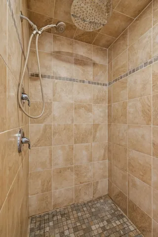 a view of a swimming pool with an outdoor seating