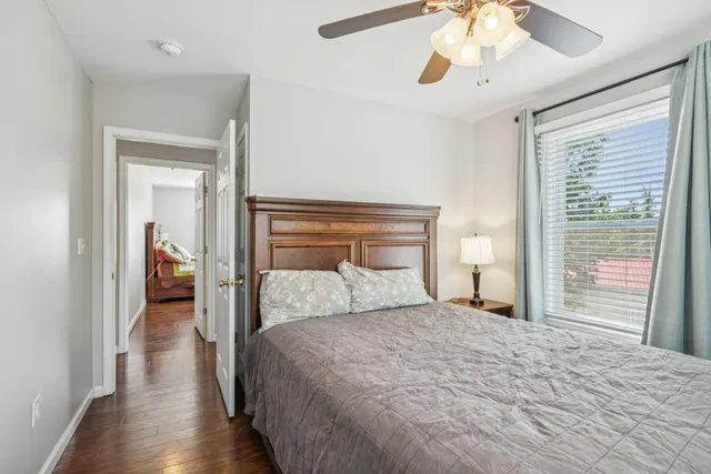 a view of a swimming pool with outdoor seating