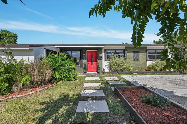 front view of house with a yard