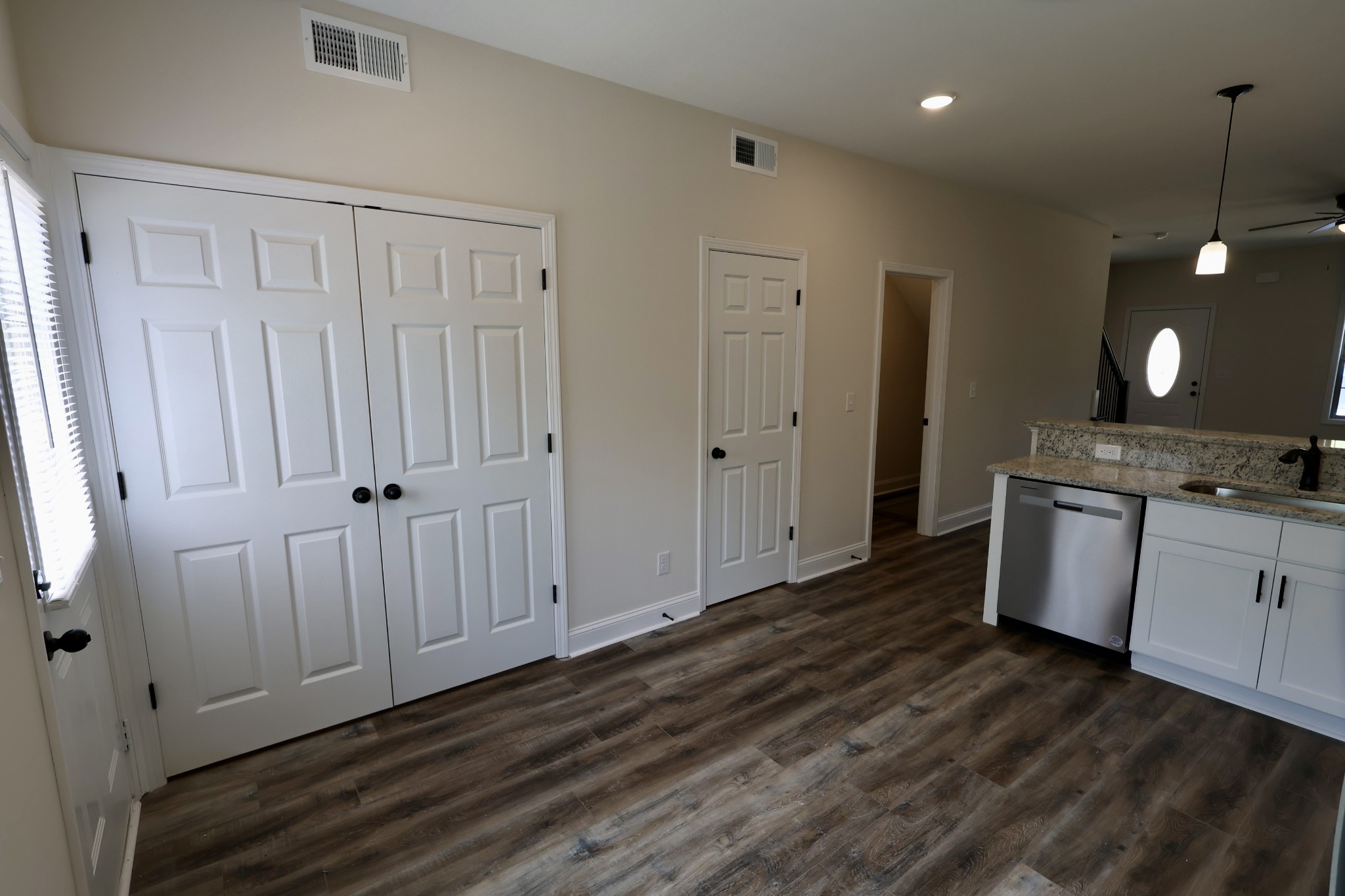 500 Peachers Mill Road, Unit B2 Clarksville, TN 37042 - Photo 13 of 33 a spacious bathroom with a granite countertop sink and a mirror