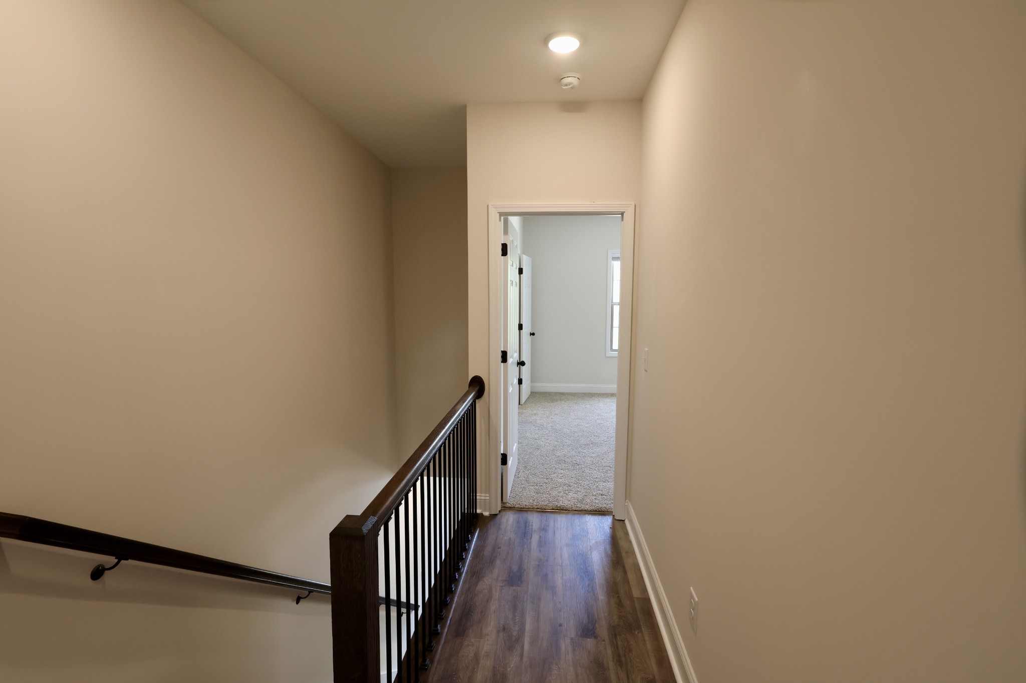 500 Peachers Mill Road, Unit B2 Clarksville, TN 37042 - Photo 23 of 33 a view of a hallway with wooden floor