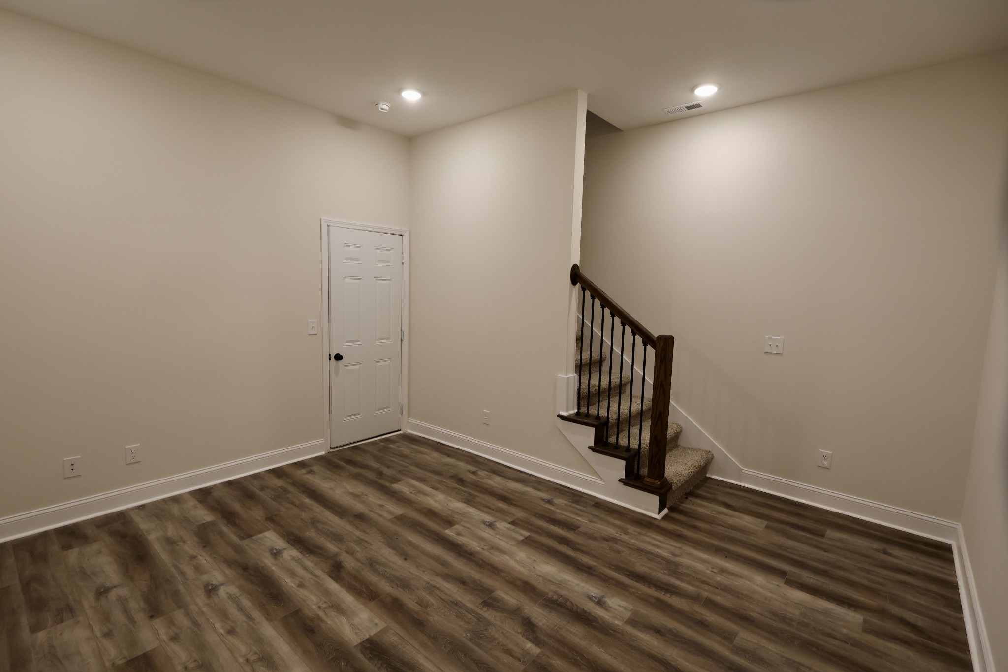 500 Peachers Mill Road, Unit B2 Clarksville, TN 37042 - Photo 30 of 33 a view of an empty room with wooden floor