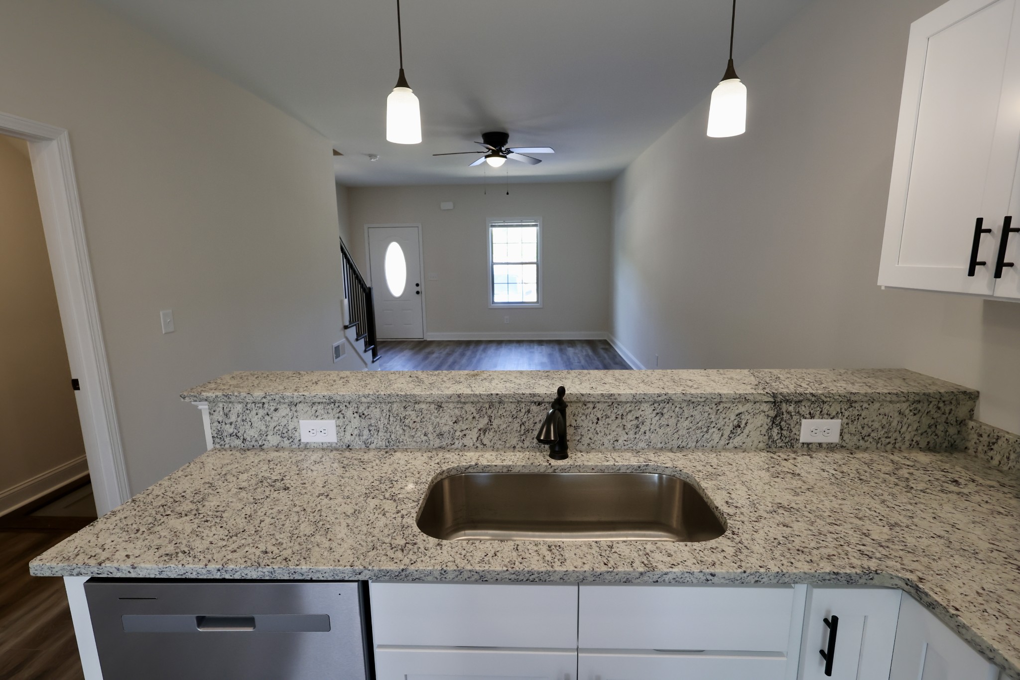 500 Peachers Mill Road, Unit B2 Clarksville, TN 37042 - Photo 10 of 33 a bathroom with a granite countertop sink a mirror and vanity