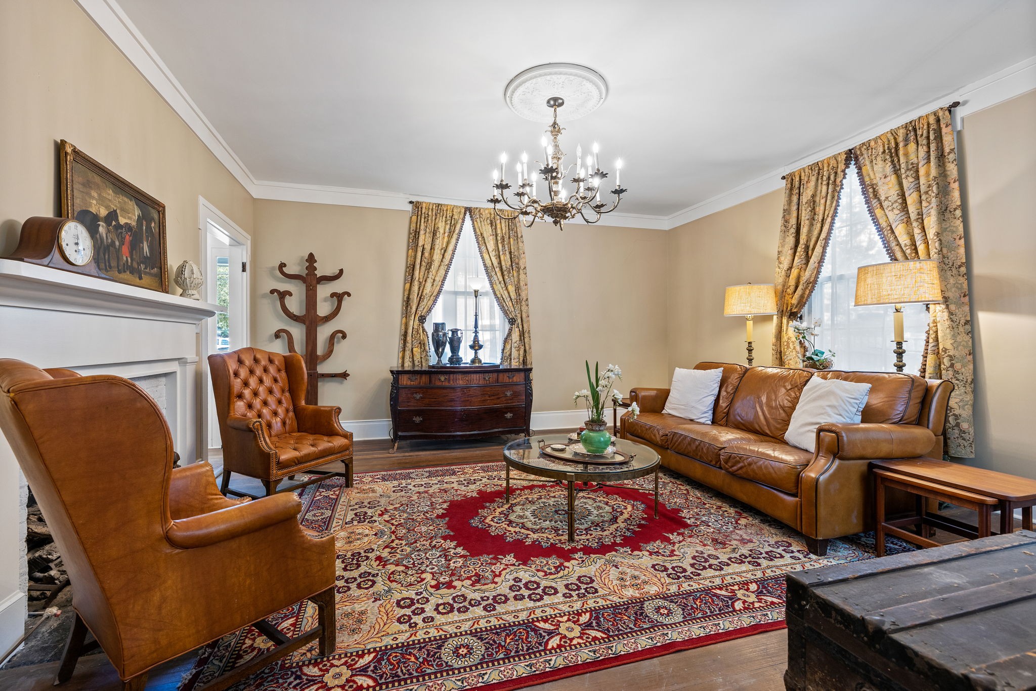415 West 9th Street Columbia, TN 38401 - Photo 15 of 70 a living room with furniture a rug and a chandelier