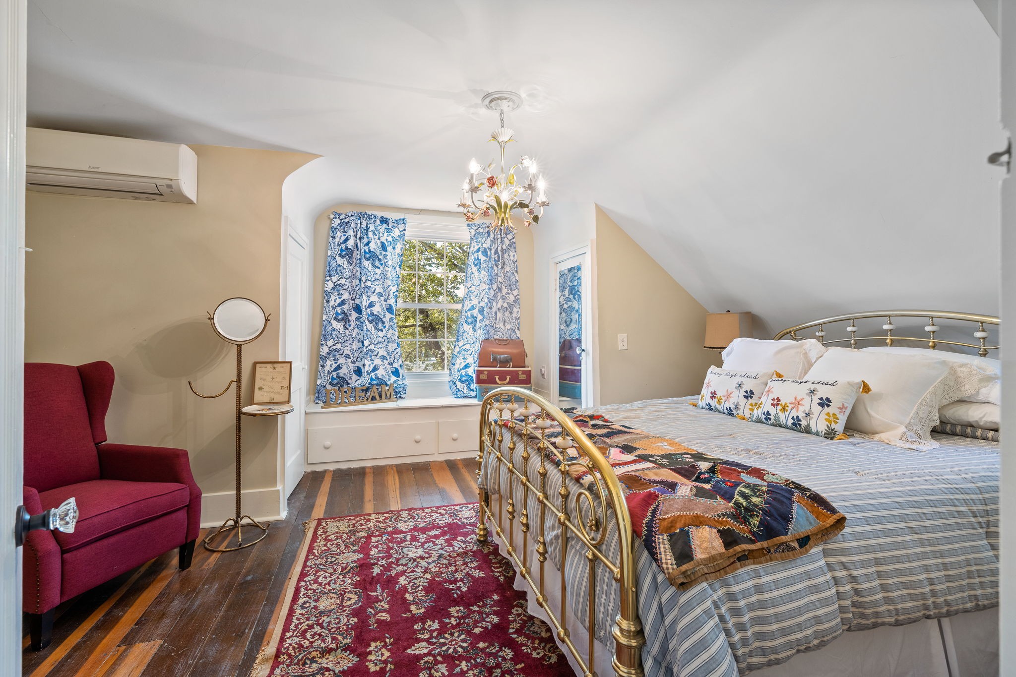 415 West 9th Street Columbia, TN 38401 - Photo 43 of 70 a bedroom with two beds and a chandelier