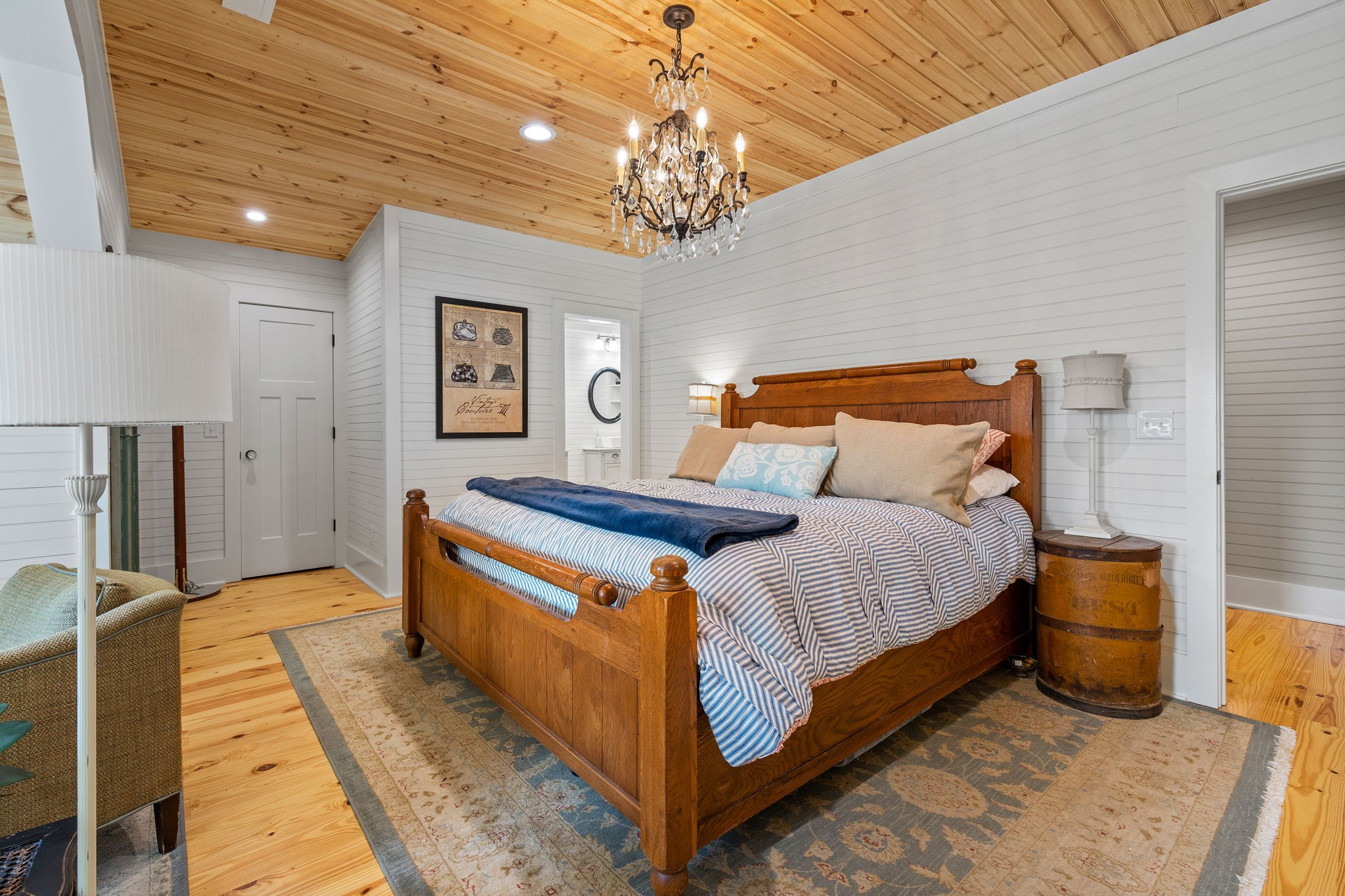415 West 9th Street Columbia, TN 38401 - Photo 48 of 70 a bed room with a bed and a chandelier