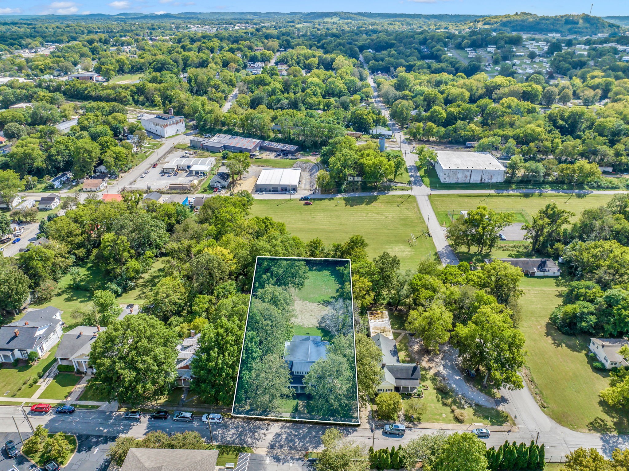 415 West 9th Street Columbia, TN 38401 - Photo 66 of 70 an aerial view of a houses with a yard and lake view