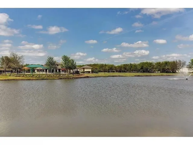 a view of a lake with houses