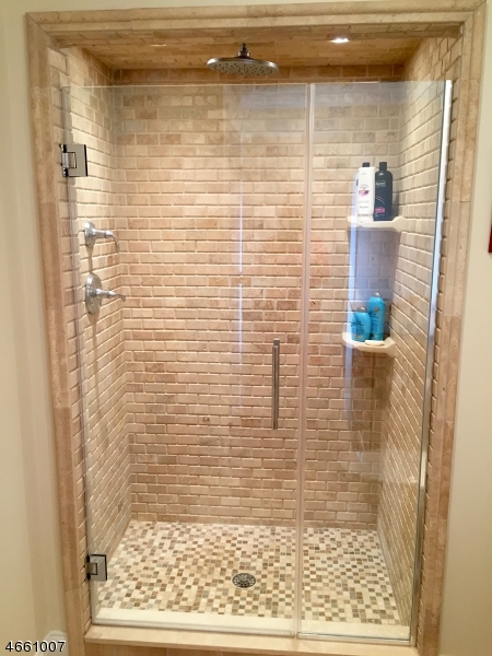 2 Spring Street Far Hills, NJ 07931 - Photo 14 of 16 a bathroom with a shower