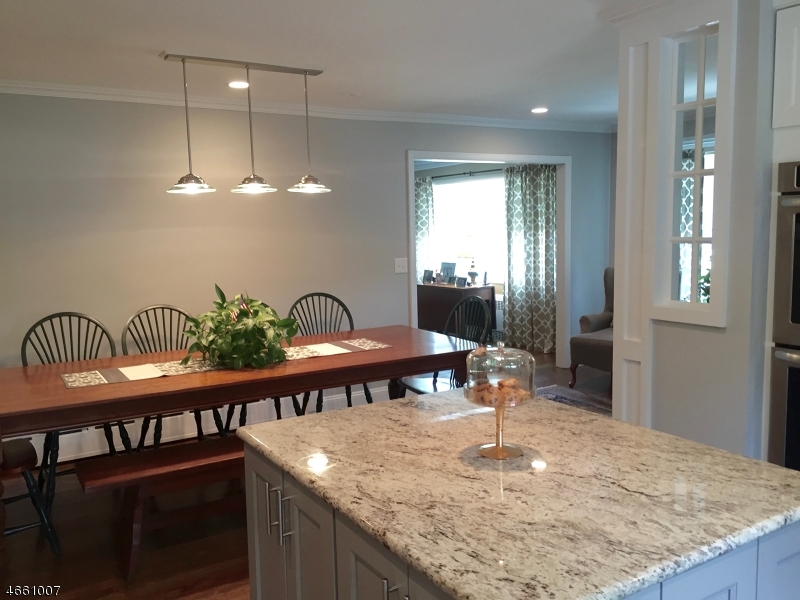2 Spring Street Far Hills, NJ 07931 - Photo 4 of 16 a view of a dining room and a chandelier