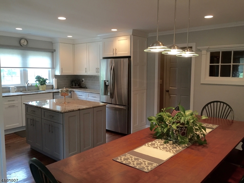 2 Spring Street Far Hills, NJ 07931 - Photo 5 of 16 a kitchen with refrigerator and sink
