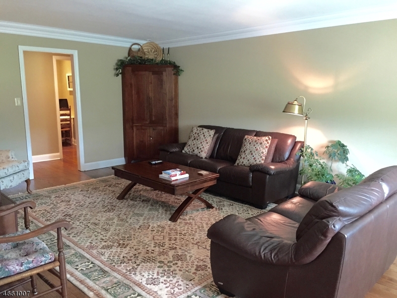 2 Spring Street Far Hills, NJ 07931 - Photo 8 of 16 a living room with furniture and a rug