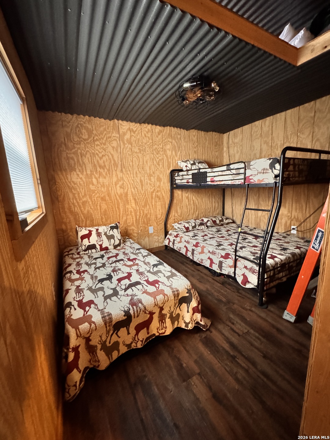884 Sd 16010 Rocksprings, TX 78880 - Photo 25 of 41 a bedroom with bed and a mirror