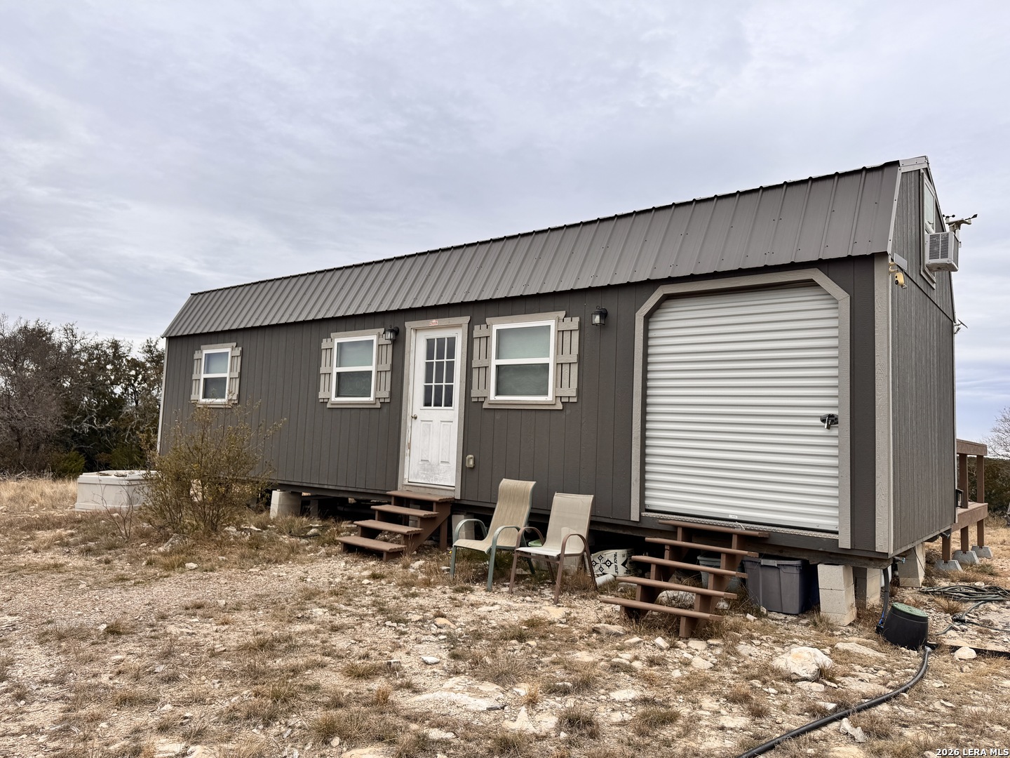 884 Sd 16010 Rocksprings, TX 78880 - Photo 28 of 41 a backyard of a house with yard and outdoor seating