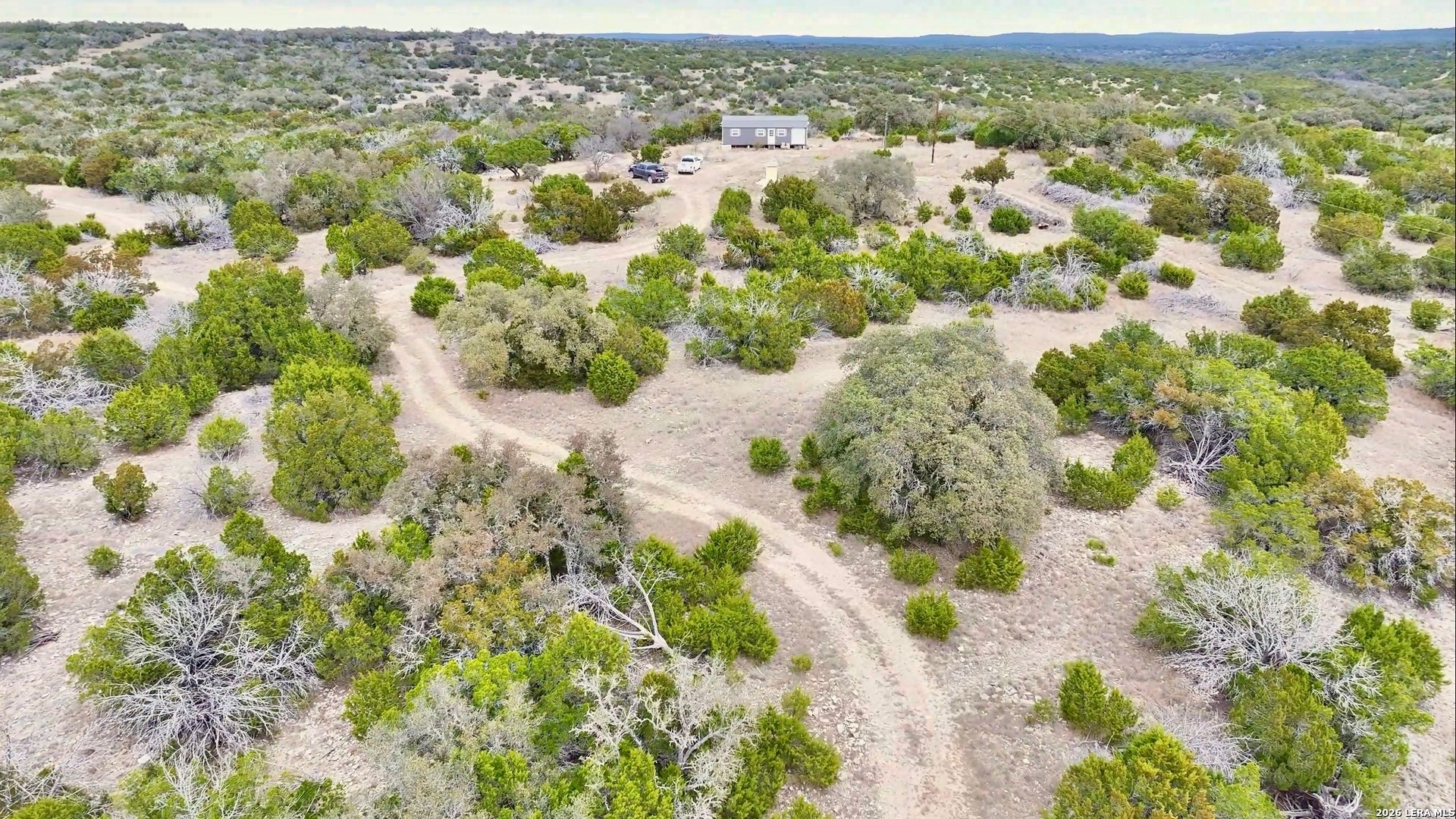 884 Sd 16010 Rocksprings, TX 78880 - Photo 36 of 41 a view of a yard with a tree