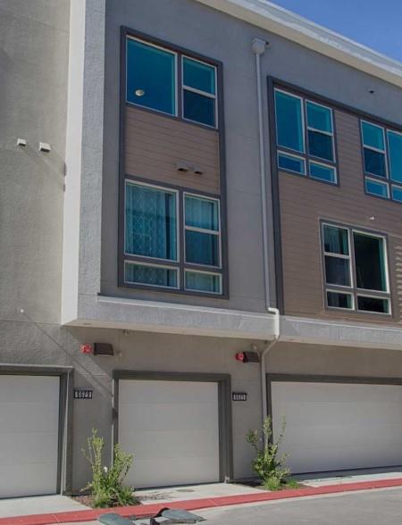6625 Optimum Loop San Jose, CA 95119 - Photo 2 of 17 a front view of a house with garage