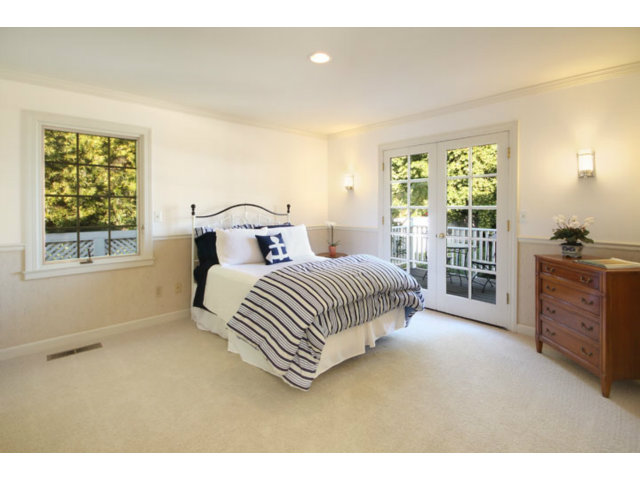 1212 Laurent Street Santa Cruz, CA 95060 - Photo 12 of 25 a bedroom with a large bed and a window