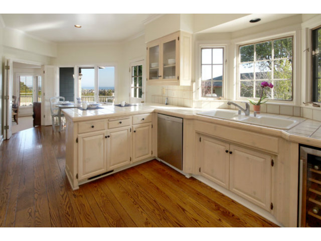 1212 Laurent Street Santa Cruz, CA 95060 - Photo 16 of 25 a open kitchen with a sink cabinets and wooden floor
