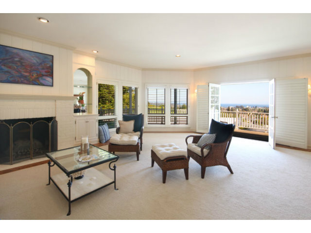 1212 Laurent Street Santa Cruz, CA 95060 - Photo 17 of 25 a living room with furniture and a fireplace