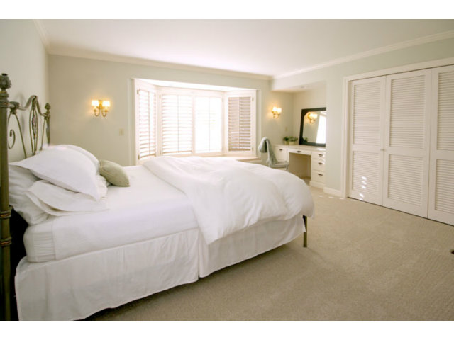 1212 Laurent Street Santa Cruz, CA 95060 - Photo 9 of 25 a bedroom with a bed and a window