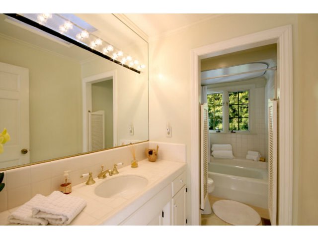 1212 Laurent Street Santa Cruz, CA 95060 - Photo 10 of 25 a bathroom with a sink and a mirror