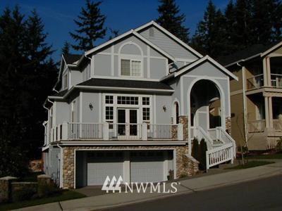 4100 Northeast 27th Place Renton, WA 98059 - Photo 1 of 1 a front view of a house with a yard
