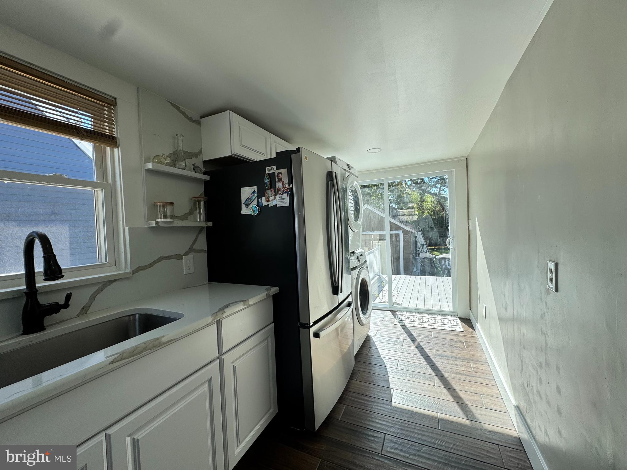1012 Phillips Avenue Salisbury, MD 21804 - Photo 16 of 33 a kitchen with a refrigerator and a sink