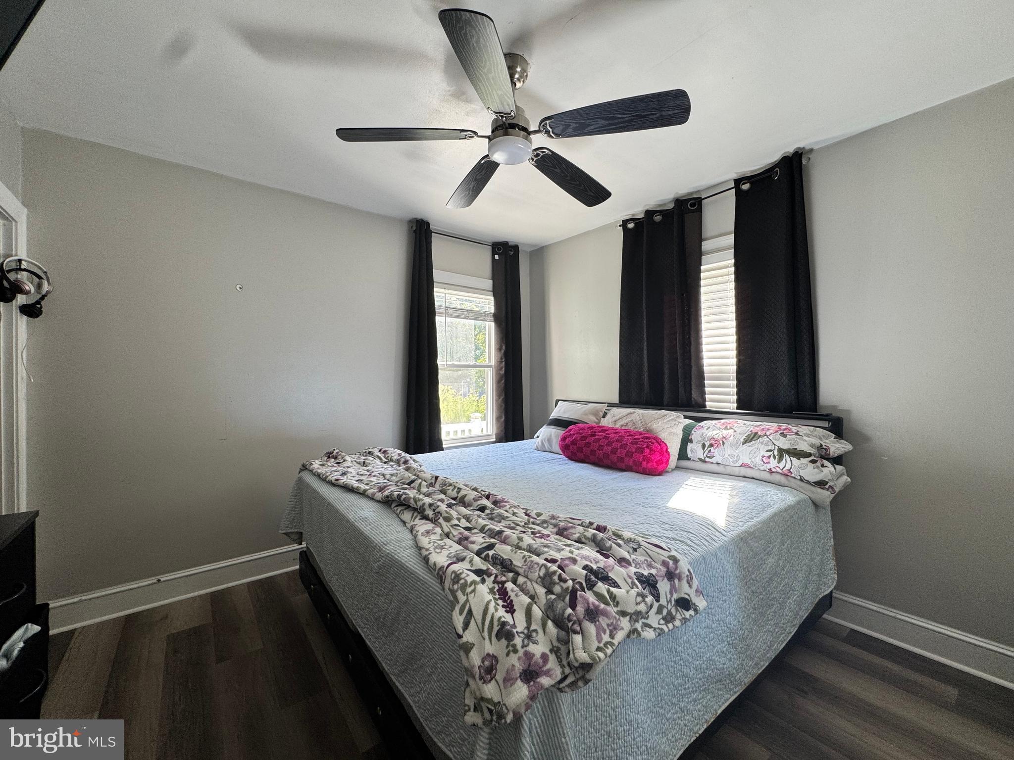 1012 Phillips Avenue Salisbury, MD 21804 - Photo 19 of 33 a bed sitting in a bedroom next to a window