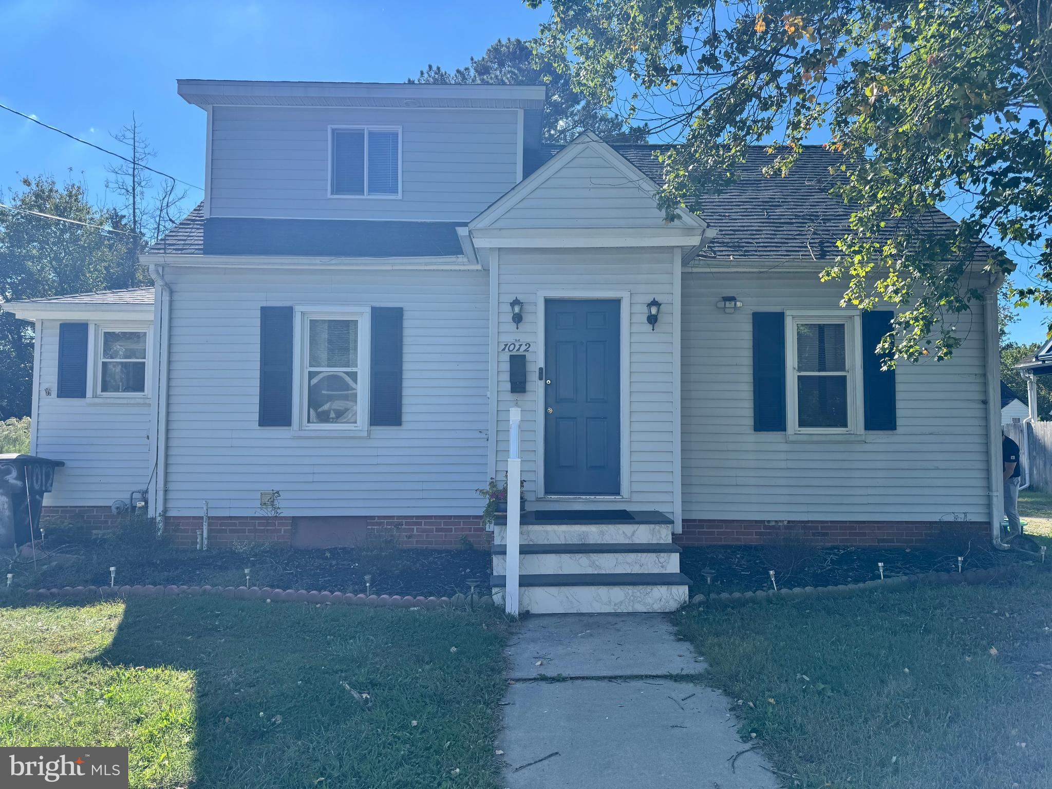 1012 Phillips Avenue Salisbury, MD 21804 - Photo 2 of 33 a front view of a house with a tree