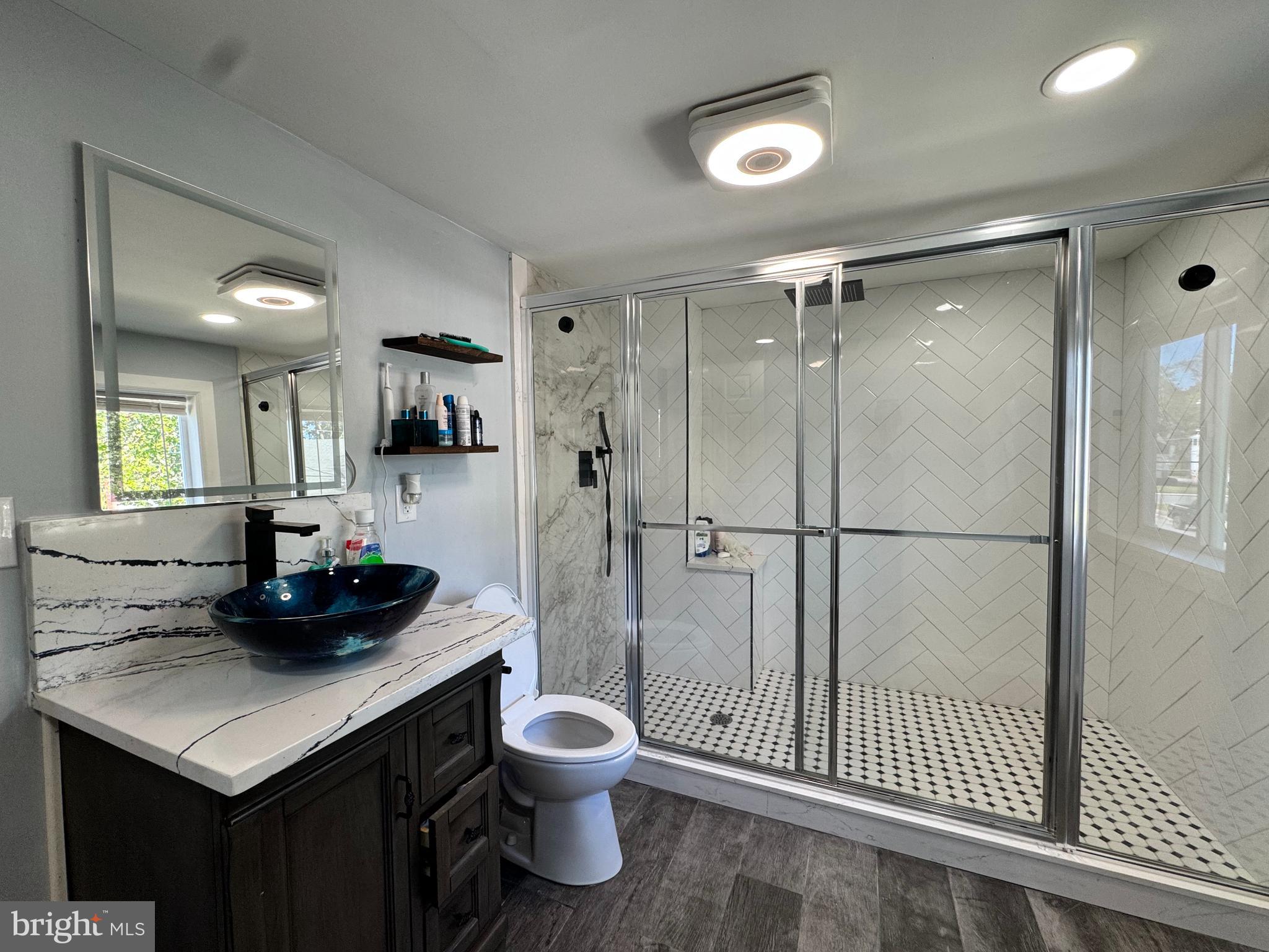 1012 Phillips Avenue Salisbury, MD 21804 - Photo 31 of 33 a bathroom with a sink toilet and shower