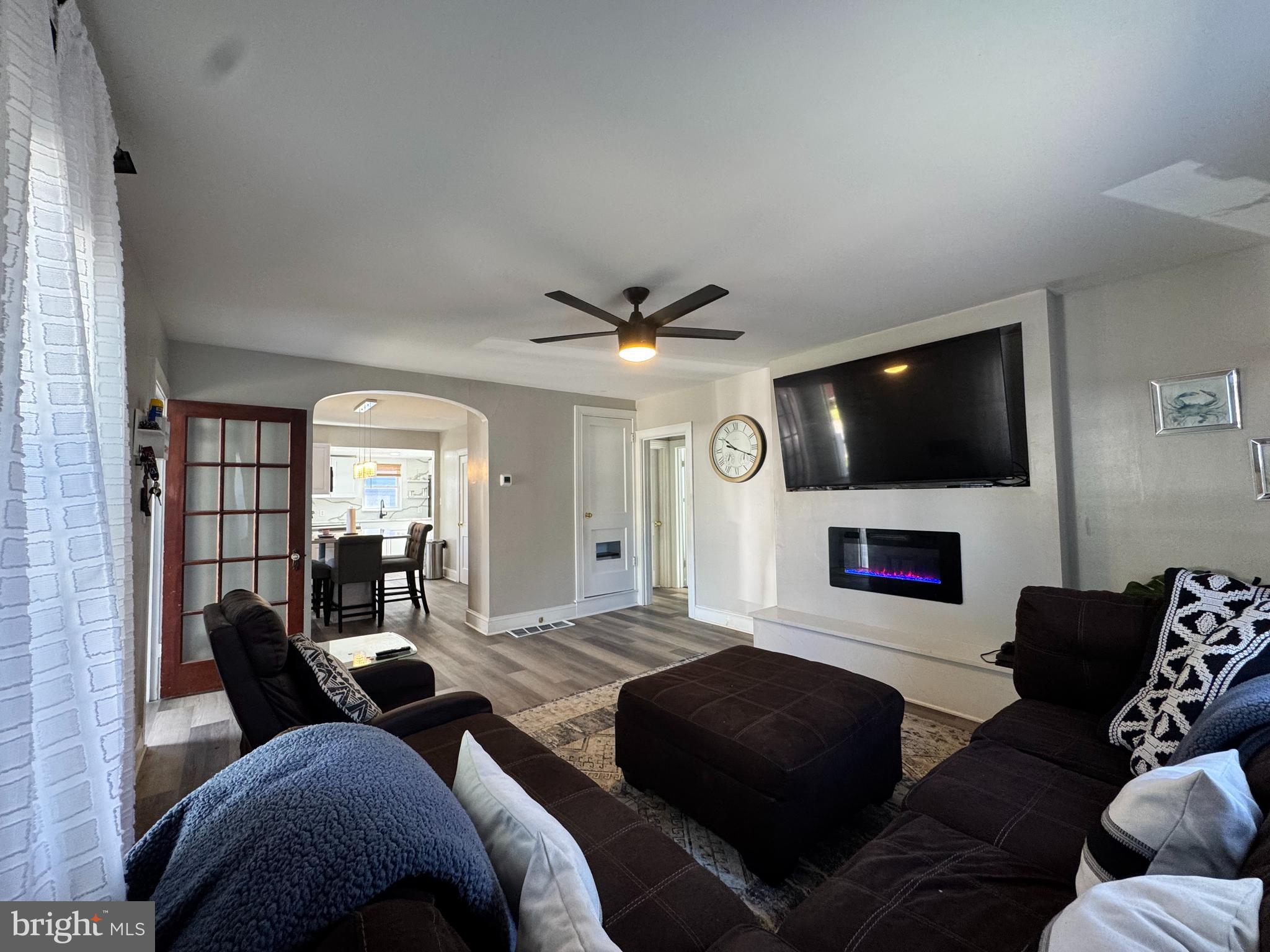 1012 Phillips Avenue Salisbury, MD 21804 - Photo 6 of 33 a living room with furniture and a flat screen tv