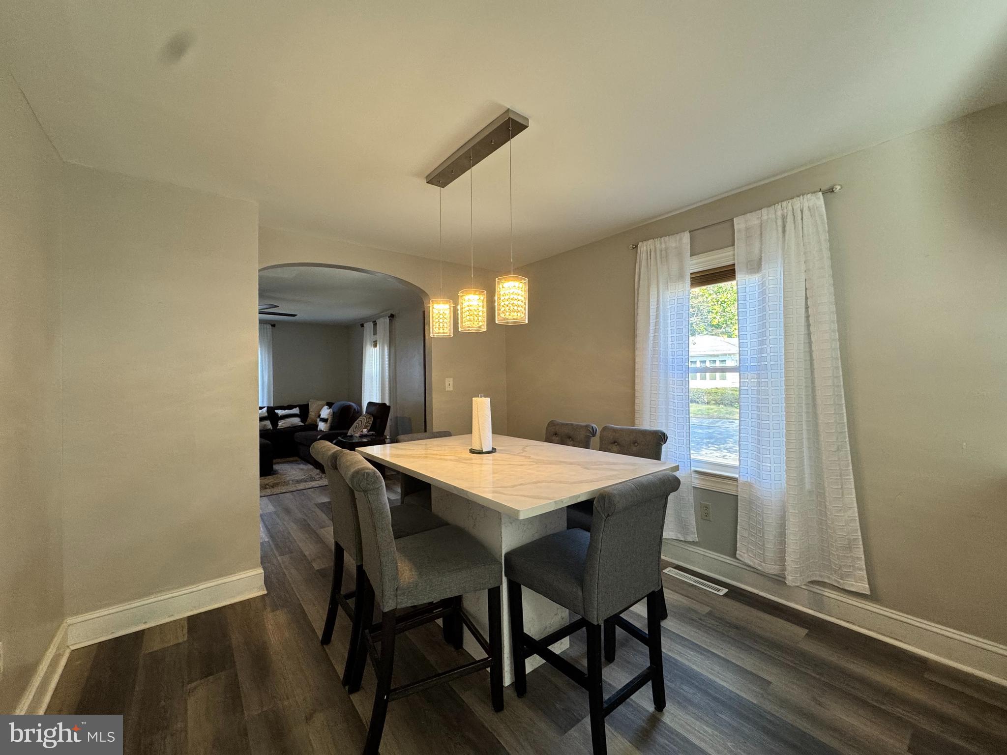 1012 Phillips Avenue Salisbury, MD 21804 - Photo 9 of 33 a view of a dining room with furniture and wooden floor