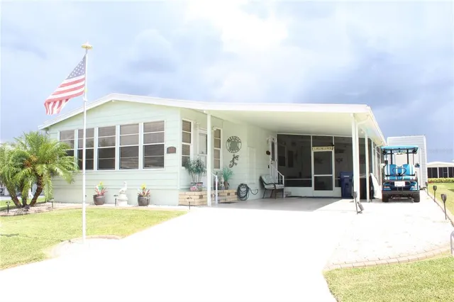 a front view of a house with a patio