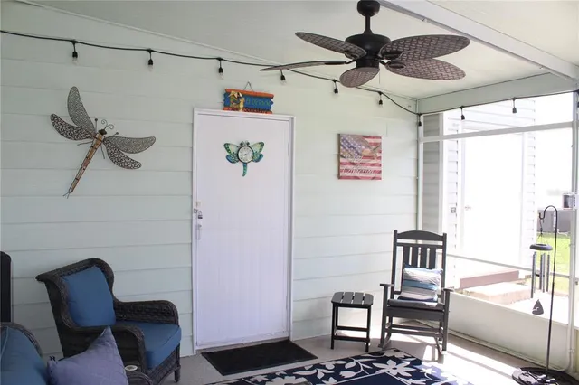 a view of entryway with workspace and window