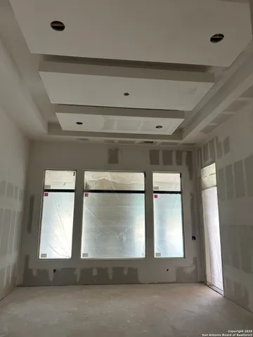 a view of a street with a building in the background