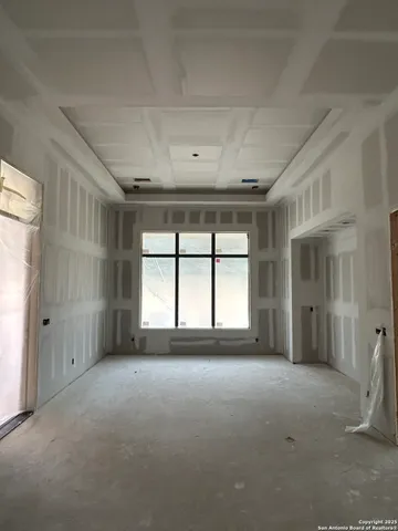 a large bathroom with a sink a large mirror and a bathtub
